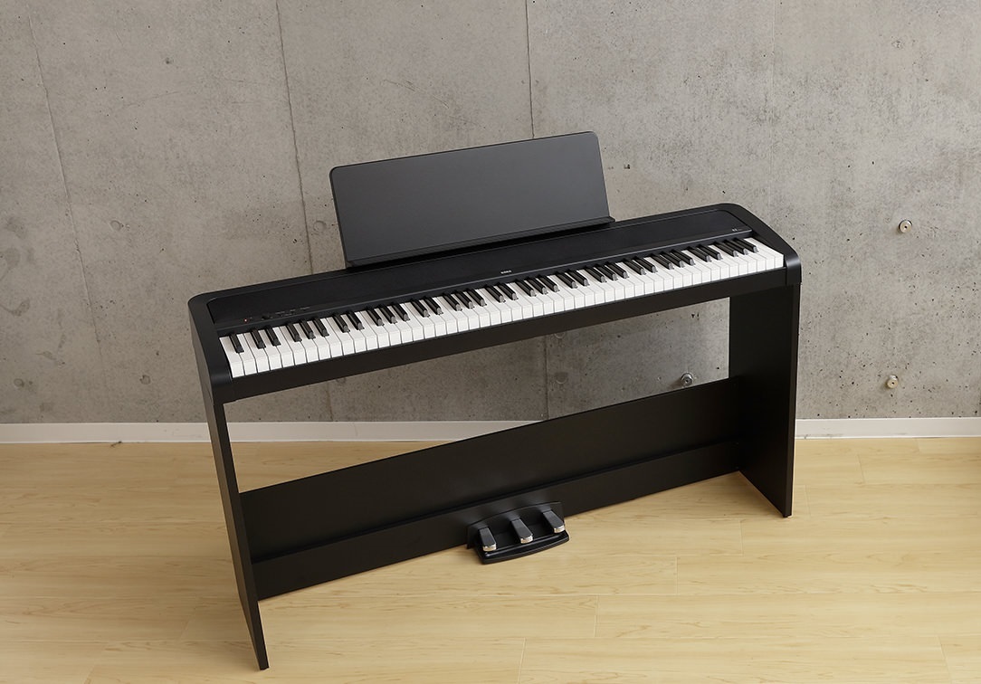 B2 Digital Piano Black with triple pedal unit and stand at