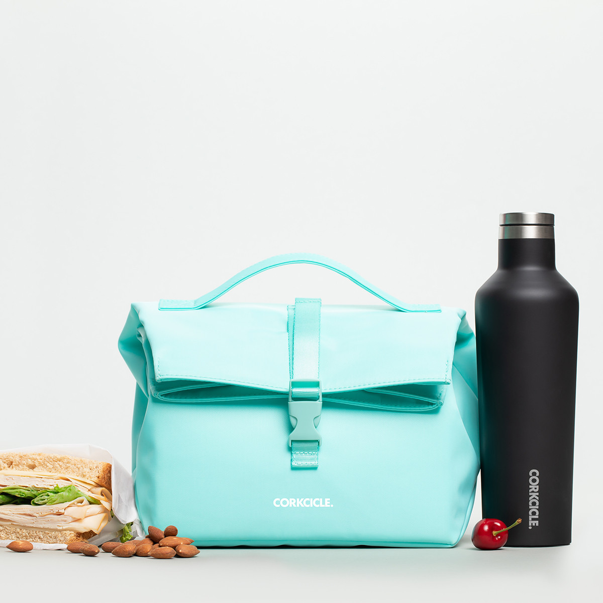 Corkcicle Nona RollTop Lunch Bag Turquoise at Mighty Ape NZ