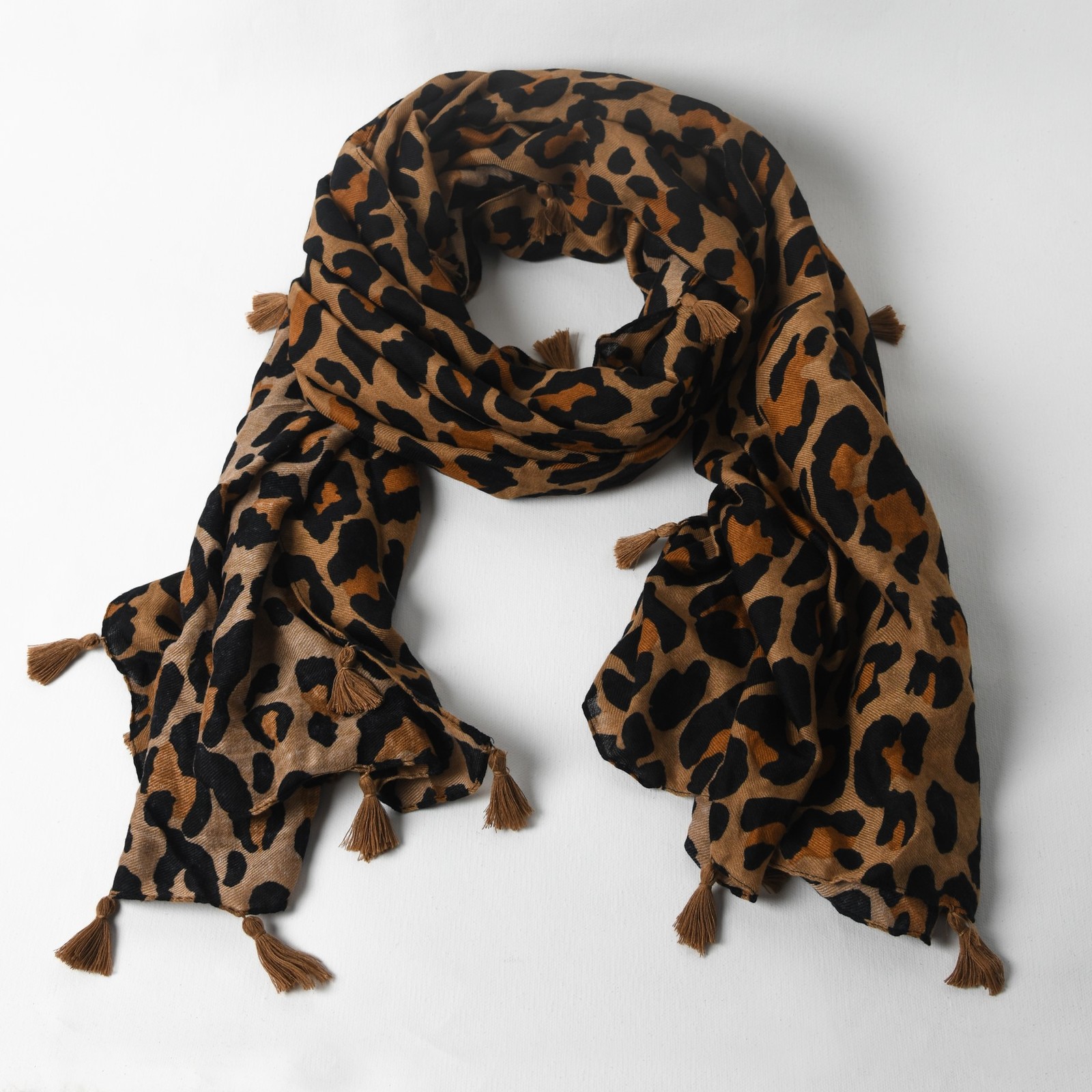 Adorne: Tassel Edge Leopard Scarf