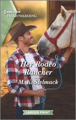 Her Rodeo Rancher by M. K. Stelmack image