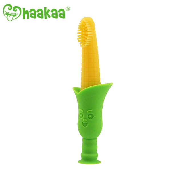 Buy Haakaa Silicone Corn Teething Toothbrush with Suction Stand at