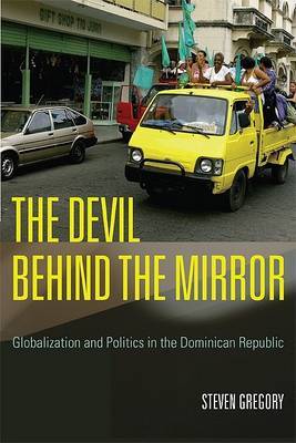 The Devil Behind the Mirror: Globalization and Politics in the Dominican Republic by Steven Gregory image