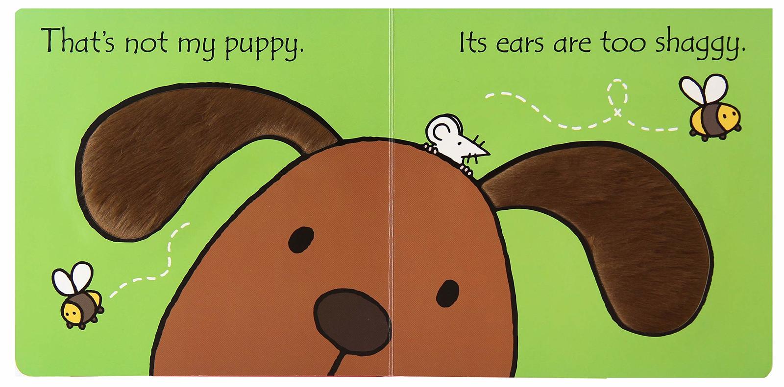 That's not my puppy... (Touch & Feel) by Fiona Watt image