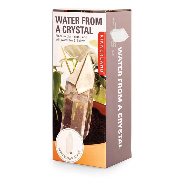 Water From A Crystal Glass Plant Feeder At Mighty Ape Nz