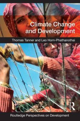 Climate Change and Development by Thomas Tanner image